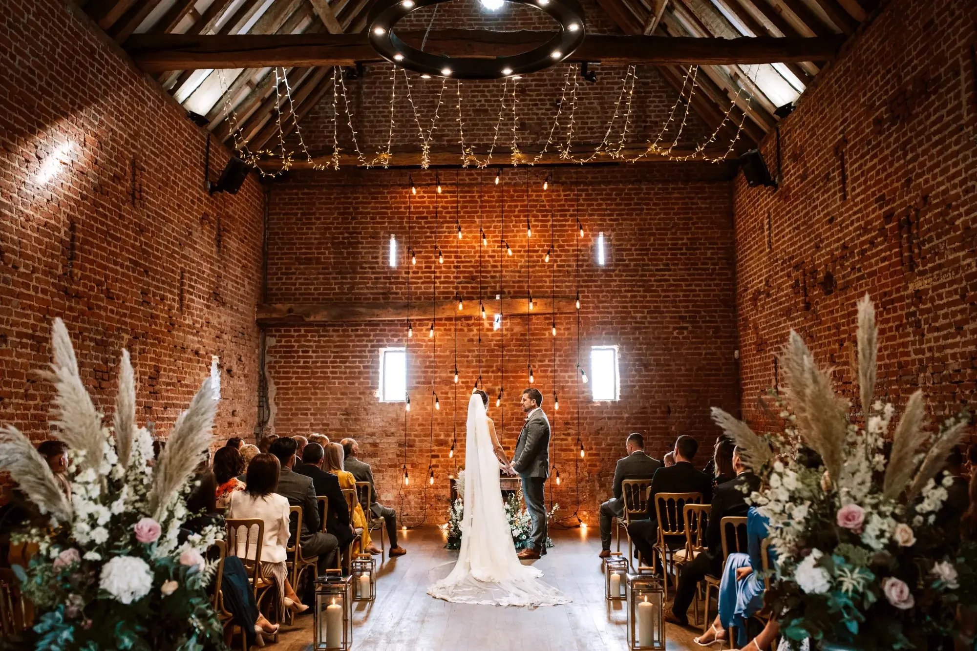 copdock hall wedding ceremony in a barn