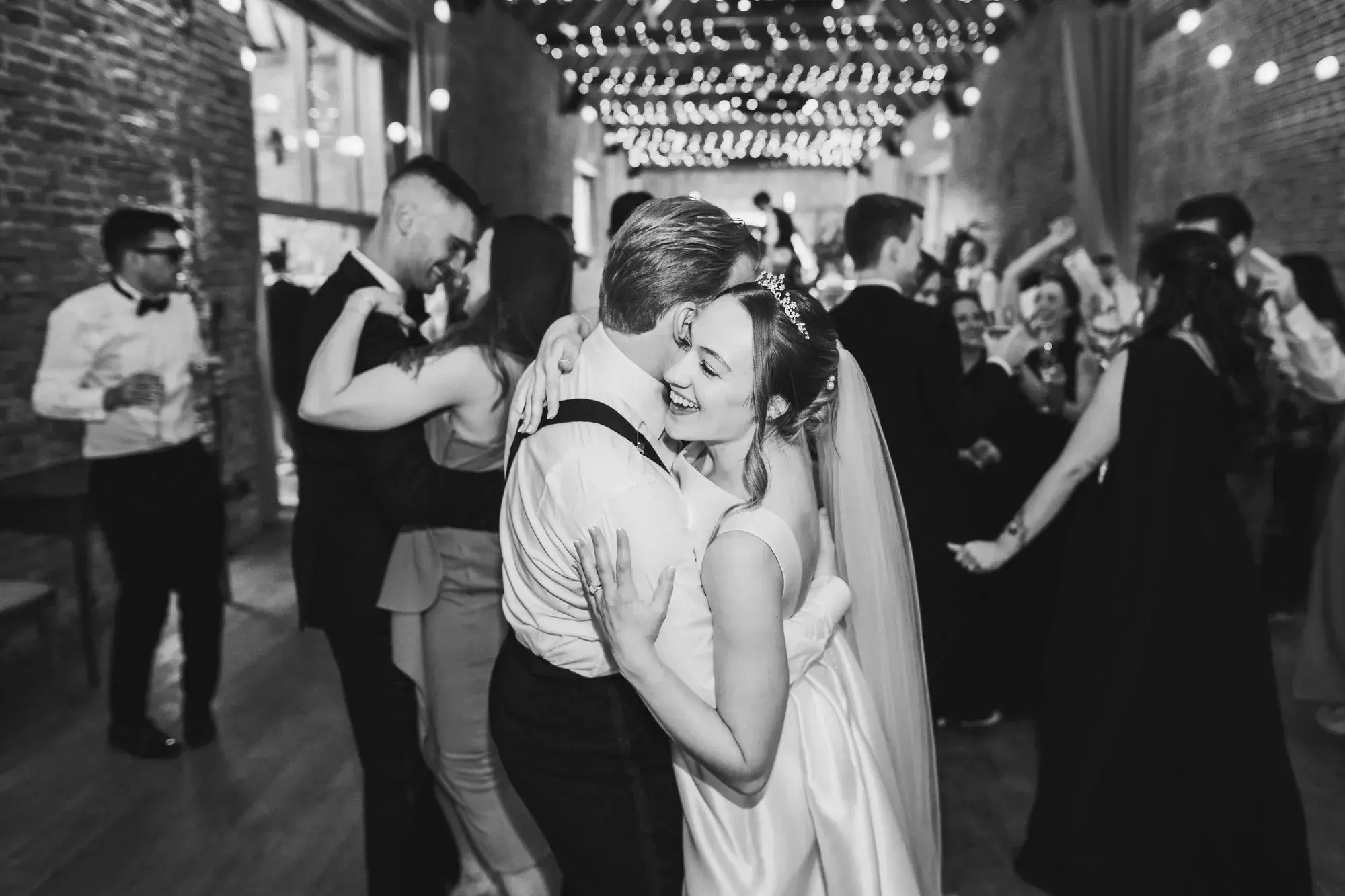 Couple dancing in the barn at Copdock Hall