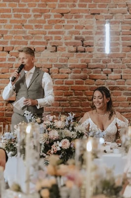 Groom giving a speech in the barn at Copdock Hall